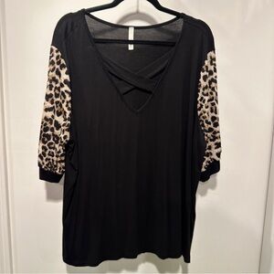 Celeste Black Blouse with Animal Print Sleeves